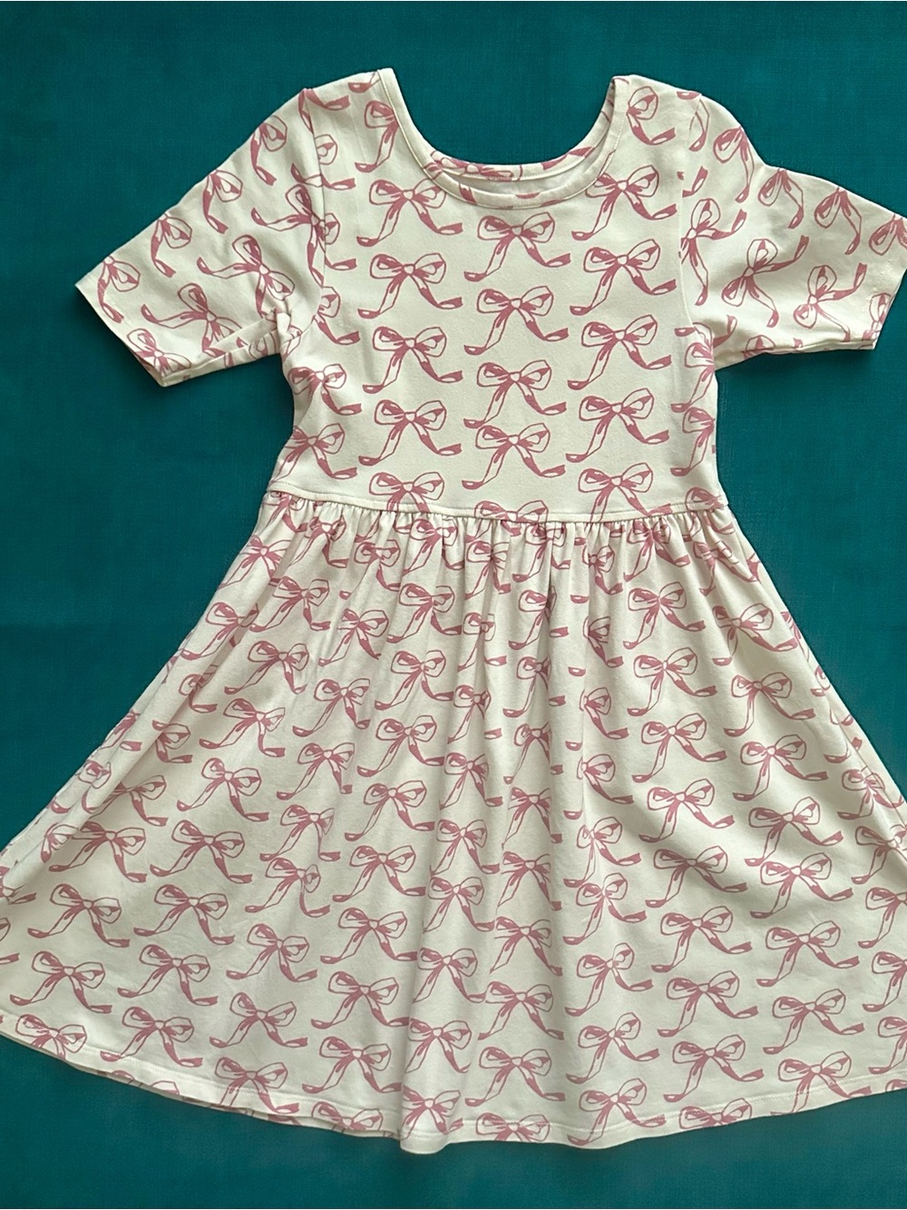 Pink chicken Size 7 Girls' Pink Bow Print Cream Dress